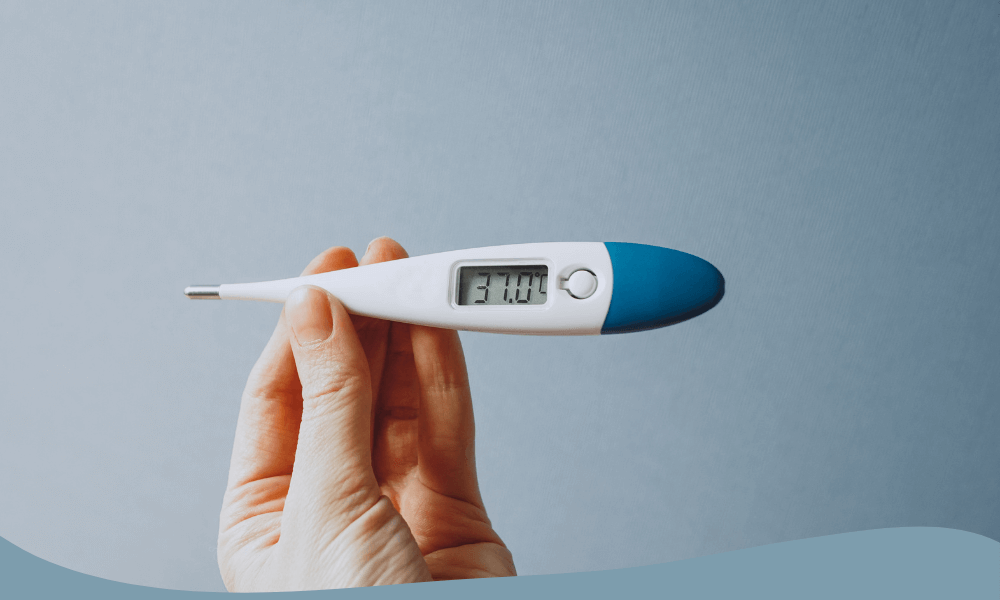 Digital febertermometer som visar 37,0°C för enkel temperaturkontroll